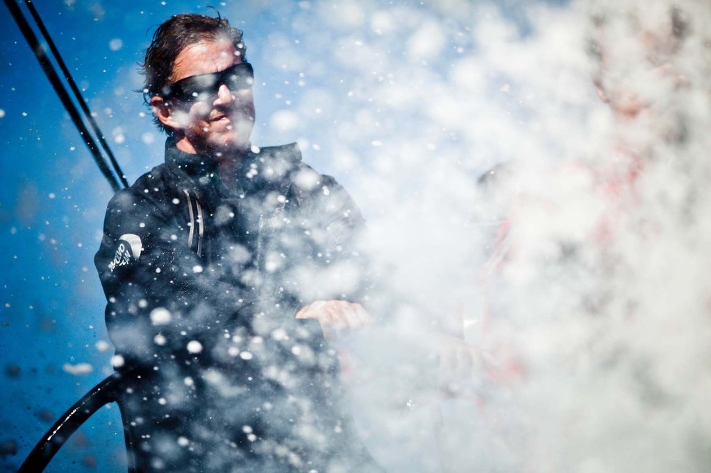 Skipper Ken Read at the wheel in windy conditions. PUMA Ocean Racing powered by BERG during Leg 1 of the Volvo Ocean Race 2011-12 © Amory Ross/Puma Ocean Racing/Volvo Ocean Race http://www.puma.com/sailing